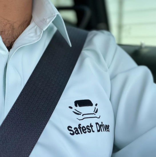 Safest Driver Dubai uniformed professional driver team in branded shirts