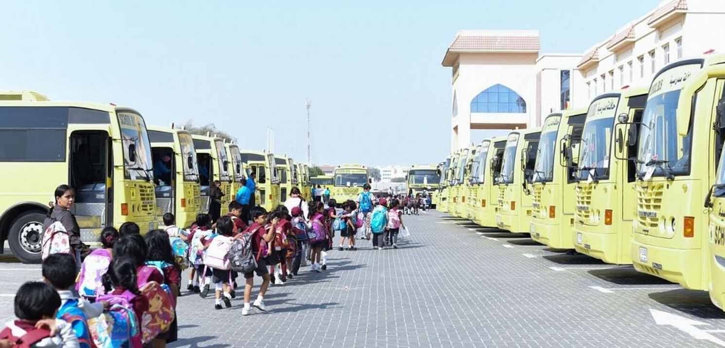 The Pros and Cons of Hiring a School Bus Service in Dubai - Kids at School Rushing Towards School Bus