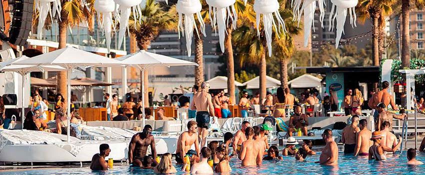 Guests Enjoying Party - Top 10 Beach and Pool Clubs in Dubai 2024